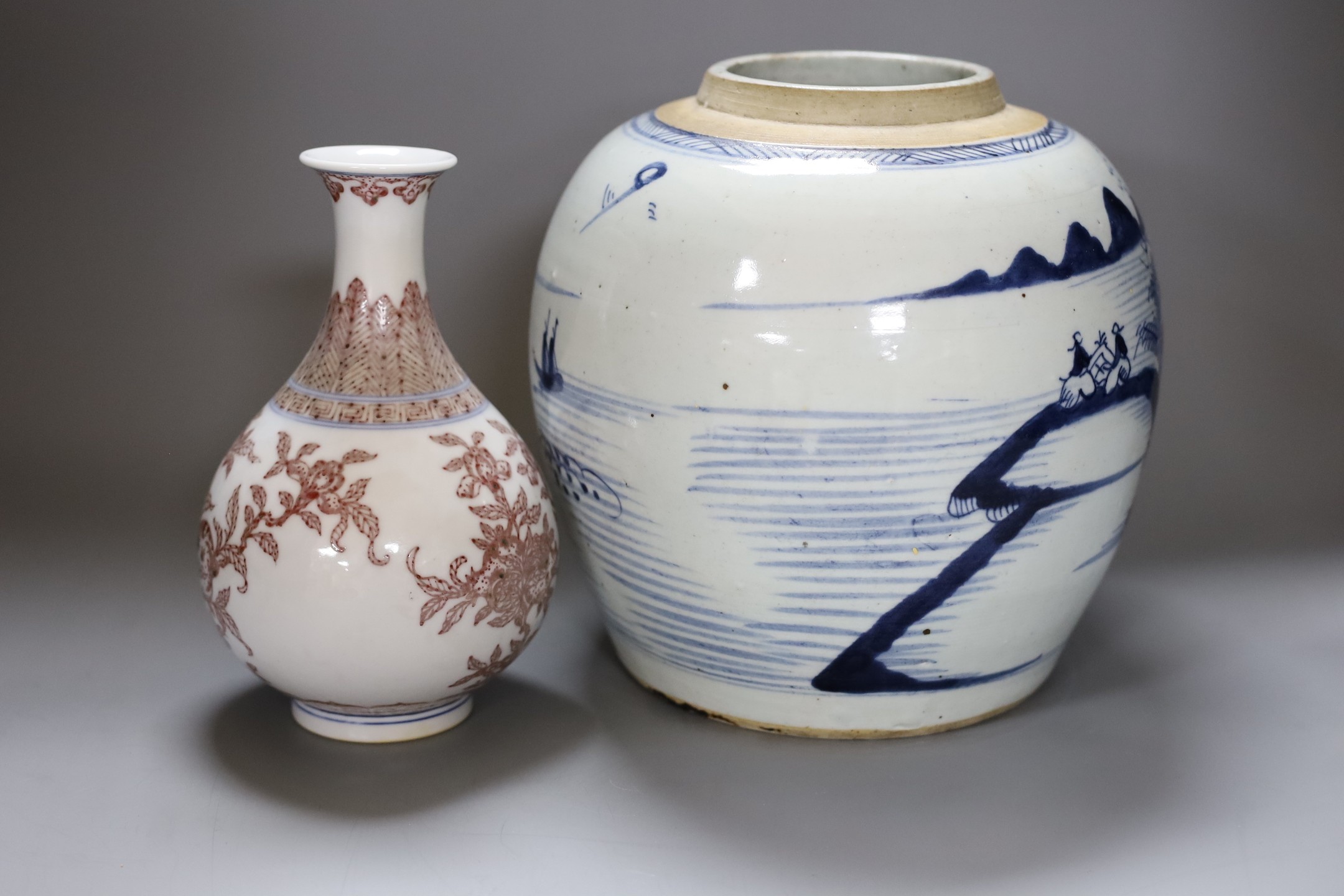 A Chinese Qing blue and white ginger jar with a painted landscape and a blue and copper-red pear shaped vase, tallest 22cm
